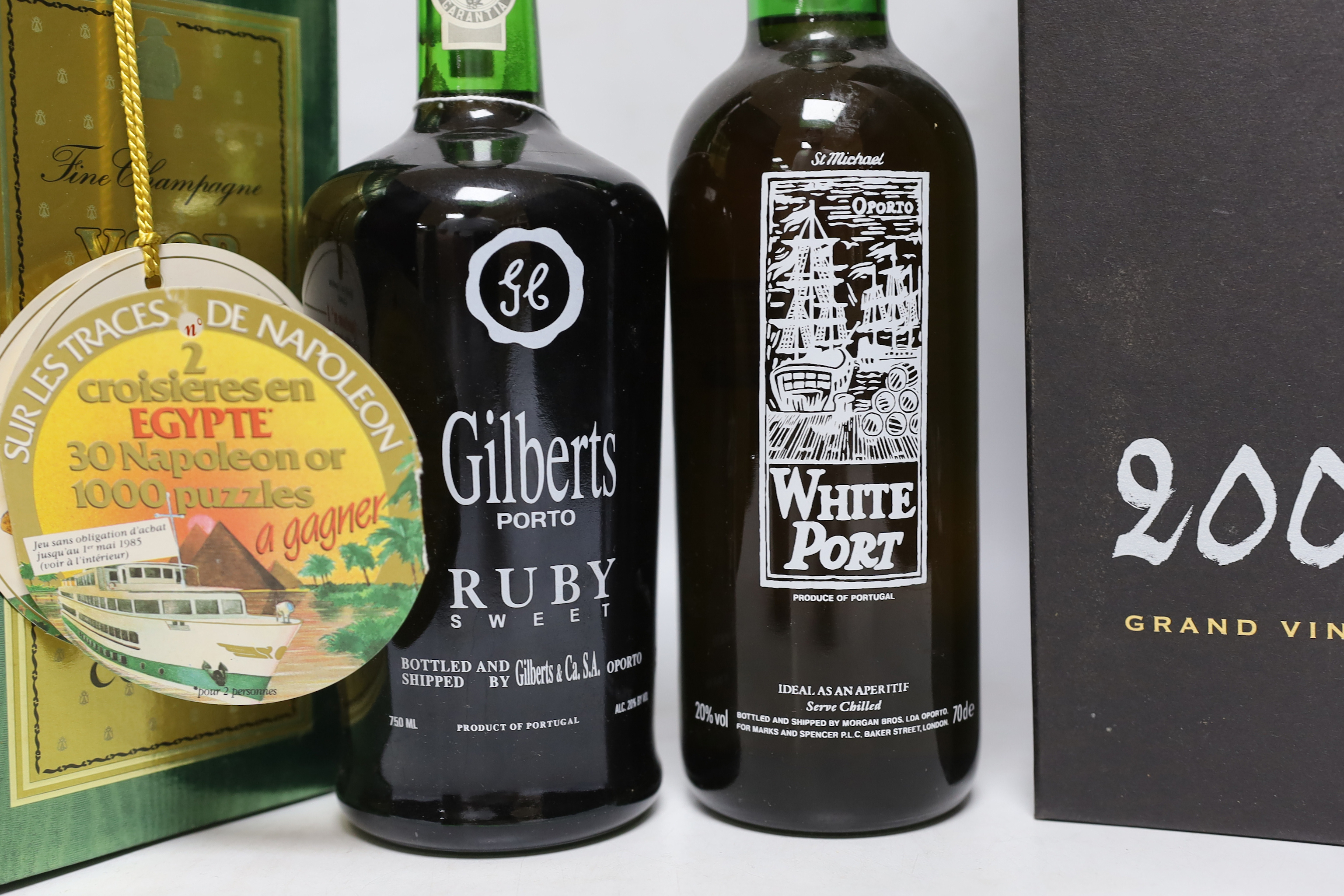 A bottle of Gilberts Port, a boxed Moet & Chandon 2004, a White Port boxed, a Courvoisier and a Noisette liqueur, (5)